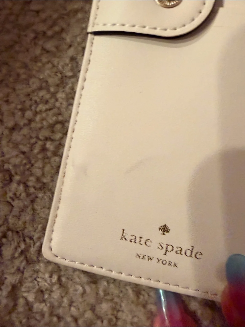 kate spade gray card holder with gold logo